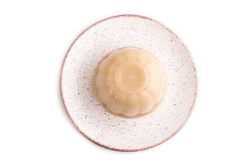 Buckwheat milk jelly isolated on white background. top view, flat lay