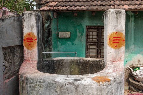Well with Tripundra, Tilaka, blessing sign, dedicated to the Hindu deity Shiva,