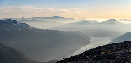 Mountains and fjord Faleidfjorden, in the evening light, view from the top of Skala, Loen, Norway,