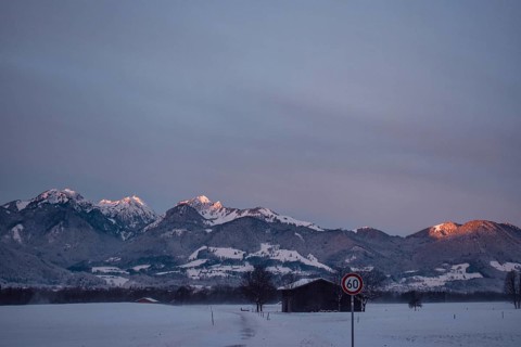 Snowy landscape at sunrise with mountain panorama, view of Wendelstein, Nussdorf, Bavaria, Germany,