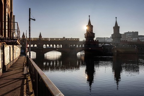 Oberbaum Bridge, underground train BVG, backlight shot sun, Friedrichshain-Kreuzberg, Berlin,
