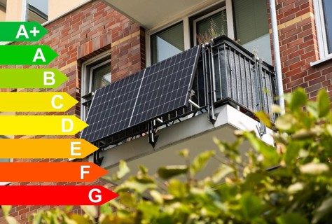 Balcony power station on an apartment block, diagram with energy efficiency classes for buildings