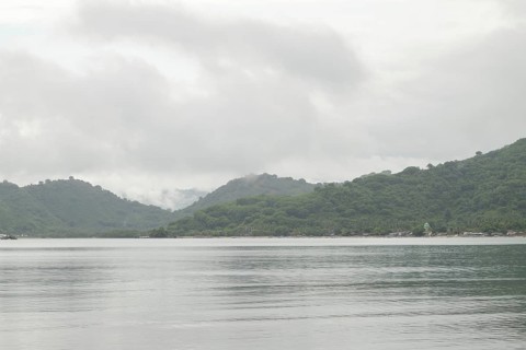 Lombok and Gili Air islands, overcast, cloudy day, sky and sea. Vacation, travel, tropics concept,