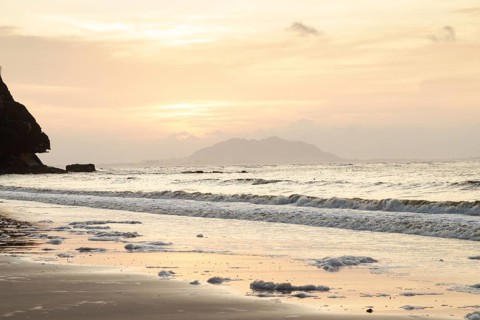 Bako national park, sea sandy beach, overcast, cloudy sunset, sky and sea, low tide. Vacation,