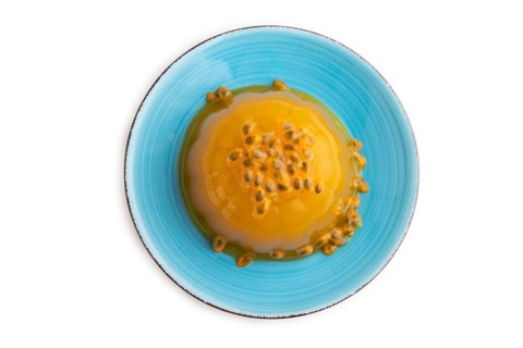 Mango and passion fruit jelly isolated on white background. top view, flat lay, close up