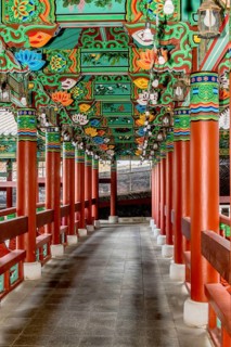 Colorful covered walkway at Buddhist temple in South Korea