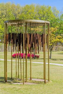 Sculpture: Wind chimes of rusted metal pipes at DMZ Peace Park. Artist unknown in Goseong, South
