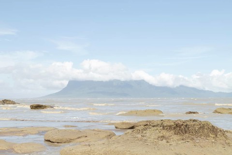 Cliff in Bako national park, sunny day, blue sky and sea. Vacation, travel, tropics concept, no