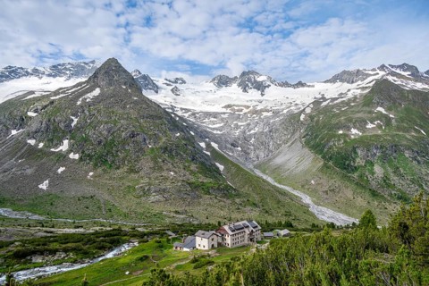 Picturesque mountain landscape, mountain hut Berliner Huette, mountain summit Steinmandl, summit