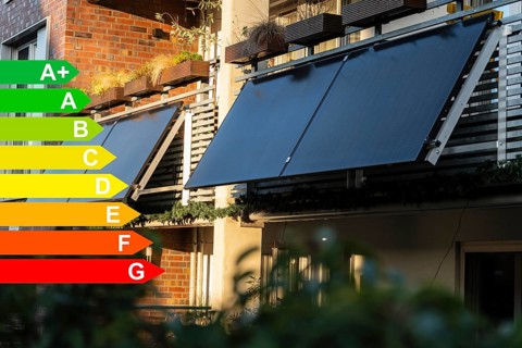 Balcony power station on an apartment block, diagram with energy efficiency classes for buildings