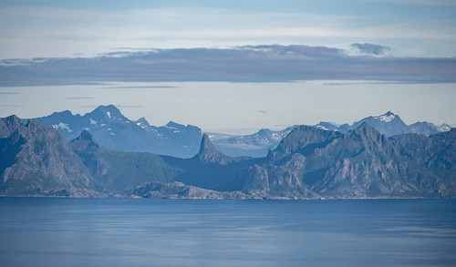 Sea Vestfjorden and mountain peaks on the coast, view from the top of Dronningsvarden or