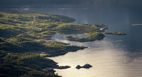 Coast in atmospheric evening light, view from the summit of Dronningsvarden or Stortinden,