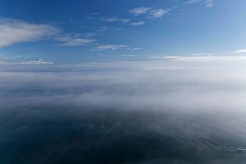 Coastal seascape in fog, Gulf of Saint Lawrence, Province of Quebec, Canada, sea, water, blue,