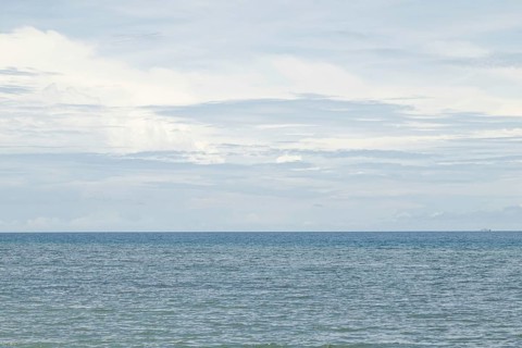 Lombok and Gili Air islands, overcast, cloudy day, sky and sea. Vacation, travel, tropics concept,