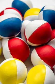 Colourful juggling balls, white behind, as background, studio shot, Germany, Europe