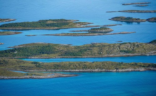 Rocky islands in the sea, Sea with archipelago islands, Ulvagsundet, Vesteralen, Norway, Europe