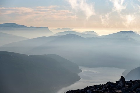 Mountains and fjord Faleidfjorden, in the evening light, view from the top of Skala, Loen, Norway,