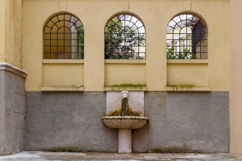 Drinking fountain in Piazetta Giuseppe Craffonara, Riva del Garda, Lake Garda North, Trento,