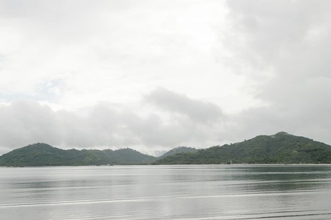 Lombok and Gili Air islands, overcast, cloudy day, sky and sea. Vacation, travel, tropics concept,