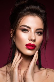 Gorgeous Young Brunette Woman face portrait. Beauty Model Girl with bright eyebrows, perfect
