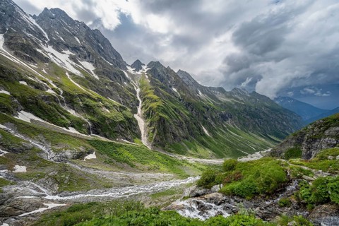 Green mountain valley Floitengrund with mountain stream Floitenbach, ascent to Greizer Huette,