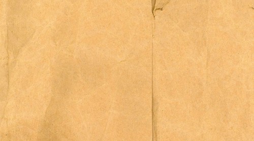Brown creased paper texture background