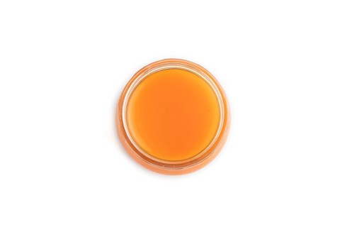 Baby puree with fruits mix, pumpkin, persimmon, mango infant formula in glass jar isolated on white
