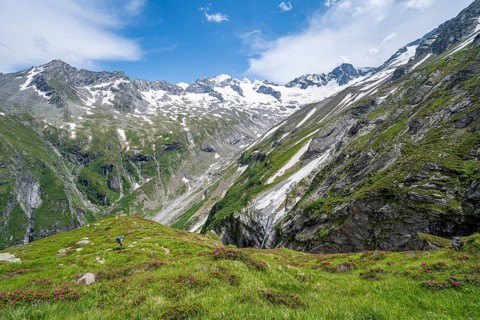 Picturesque mountain landscape with rocky mountains and glaciers, behind mountain peak Grosser