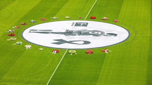 Banner with Franz Beckenbauer and wreaths of flowers, funeral service of FC Bayern Munich for Franz