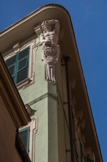 Sculpture of an altant as a roof support, Genoa, Italy, Europe