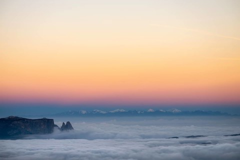 Sea of fog with Dolomite peaks in the background at blue hour, Corvara, Dolomites, Italy, Europe