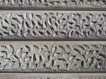 Grey ashlar plaster wall background