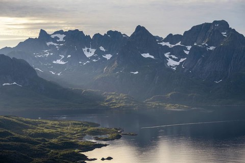 Fjord Raftsund and mountains in atmospheric evening light, view from the summit of Dronningsvarden