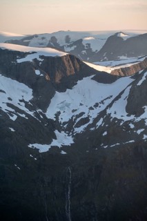 Mountain peak with Jostedalsbreen glacier in the evening light, view from the summit of Skala,