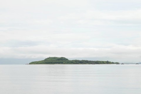 Lombok and Gili Air islands, overcast, cloudy day, sky and sea. Vacation, travel, tropics concept,