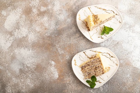 Walnut and almond cake on brown concrete background. top view, flat lay, copy space