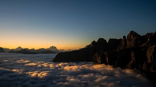Sunrise over a sea of fog and Dolomite peaks in the background, Corvara, Dolomites, Italy, Europe