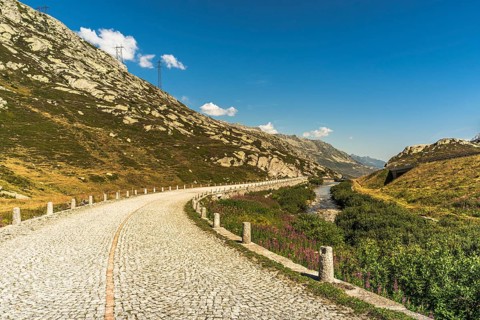Gotthard Pass, mountain landscape and old pass road with cobblestones, Canton Ticino, Switzerland,