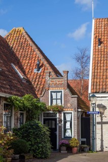 Fishing village Oosterend with the smallest house of Oosterend, North Sea island Texel, North