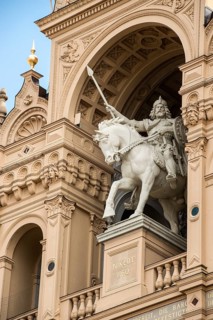 Schwerin Castle, front facade with equestrian statue of Prince Niklot in war armour with spear and