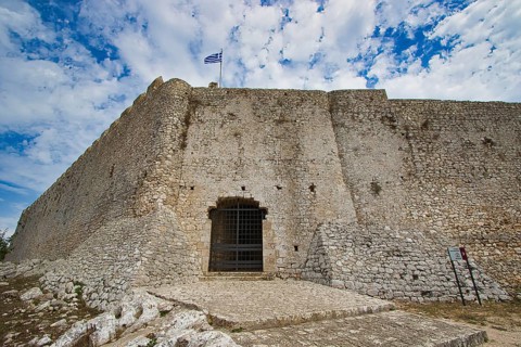 Fortress with Greek flag on a cloudy day, Chlemoutsi, High Medieval Crusader Castle, Kyllini