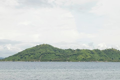 Lombok and Gili Air islands, overcast, cloudy day, sky and sea. Vacation, travel, tropics concept,