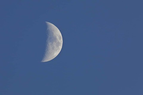Waxing moon (Luna) in the early evening under a blue sky, Wilnsdorf, North Rhine-Westphalia,