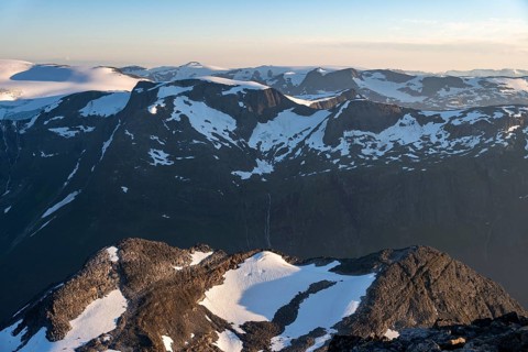 Mountain peak with Jostedalsbreen glacier in the evening light, view from the summit of Skala,