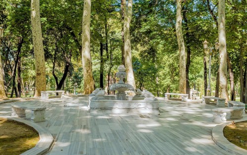 Decorative fountain on plaza in public urban park in Istanbul, Tuerkiye