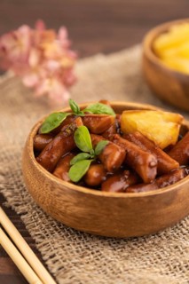 Tteokbokki or Topokki, fried rice cake stick, popular Korean street food with spicy jjajang sauce