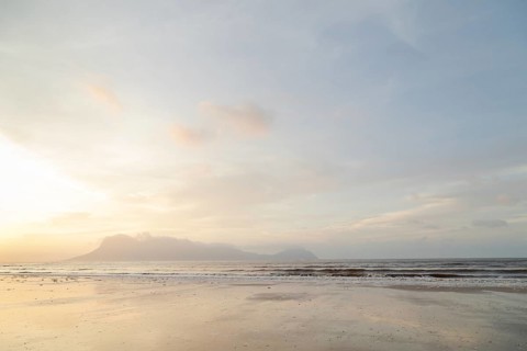 Bako national park, sea sandy beach, overcast, cloudy sunset, sky and sea, low tide. Vacation,