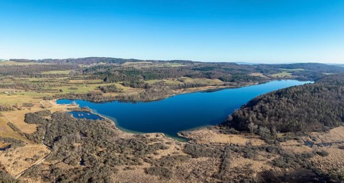 Aerial panorama of Lake Mindelsee, a glacial tongue lake on the Bodanrueck, district of Constance,