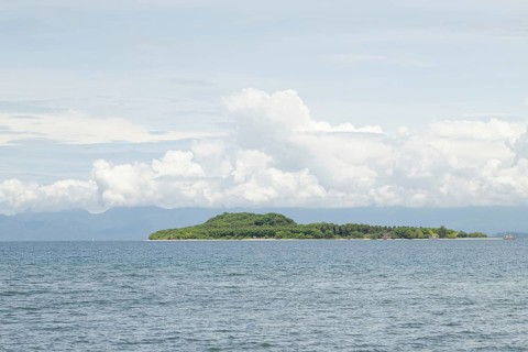 Lombok and Gili Air islands, overcast, cloudy day, sky and sea. Vacation, travel, tropics concept,