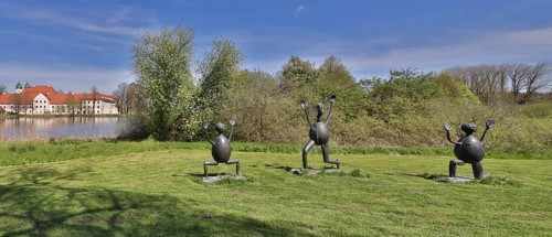 Three sculptures by Heinrich Kirchner in front of Seeon Monastery, dream weather in May, Seeon,
